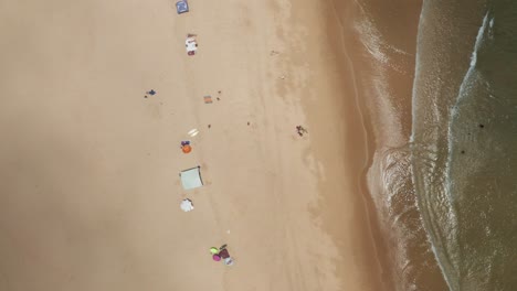 A-birds-eye-view-of-tourists-enjoying-a-day-at-the-beach-in-Mozambique