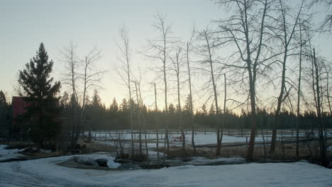 Beautiful-sunrise-over-frozen-snowy-farmland-ranch