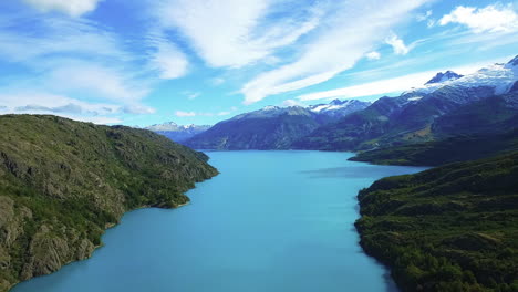 AERIAL---General-Carrera-Lake-and-Andes,-Patagonia,-Chile,-wide-shot-pan-right