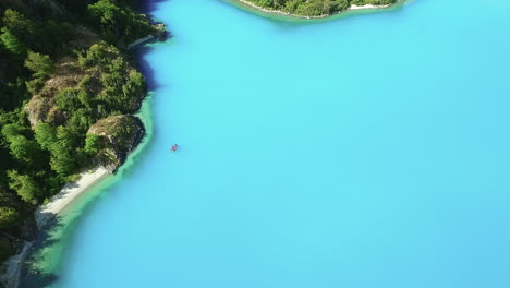 AERIAL---General-Carrera-Lake's-turquoise-waters,-Chile,-wide-shot-top-down