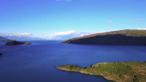AERIAL---General-Carrera-Lake-and-horizon-in-Patagonia,-Chile,-wide-shot-forward