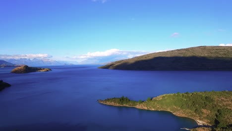 AERIAL---General-Carrera-Lake-and-horizon-in-Patagonia,-Chile,-wide-shot