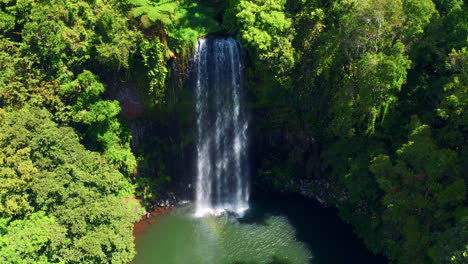 Aerial-View-Of-Millaa-Millaa-Waterfall-With-Lush-Vegetation-In-Tablelands-Region,-Queensland,-Australia---drone-shot