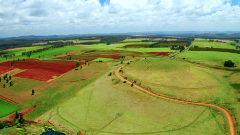 Panoramic-View-On-Colorful-Fields-In-Atherton-Tablelands,-Queensland,-Australia-On-A-Cloudy-Day---drone-shot