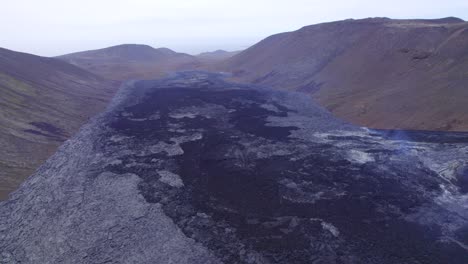 The-Lava-Field-of-Fagradalsfjall-Volcano,-Geldingadalir-Valley,-Iceland---aerial-drone-shot