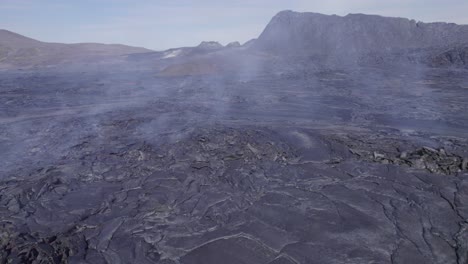 Gas-And-Smoke-Rising-From-Lava-Flowing-In-The-Valley-Due-To-Fagradalsfjall,-Geldingadalsgos-Eruption