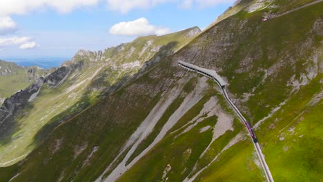 Aerial:-steam-rack-railway-climbing-a-mountain
