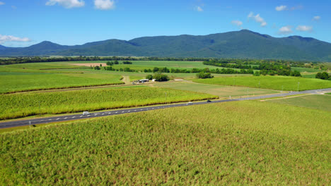 Scenery-Of-Plains-And-Fields-With-Country-Road-In-Cairns,-QLD-Australia