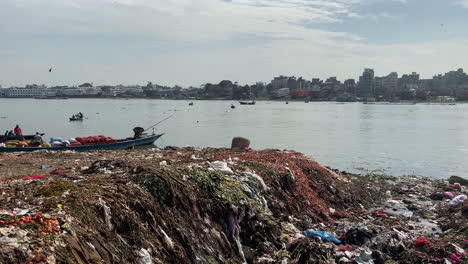 Garbage-into-sewage.-River-water-pollution