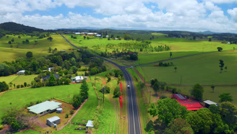 Vehicle-Driving-On-The-Scenic-Country-Road-Of-Atherton-Tablelands-Region,-Queensland,-Australia---aerial-hyperlapse