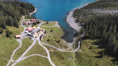 Aerial:-Oeschinen-lake-among-rocky-mountains-in-the-Alps