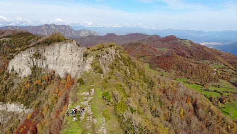 Aerial:-narrow-plateau-and-mountain-range-in-autumn-season