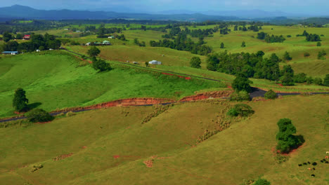 Rural-Scene-With-Lush-Hills-And-Vegetation-In-Atherton-Tablelands,-Queensland,-Australia---aerial-drone-shot