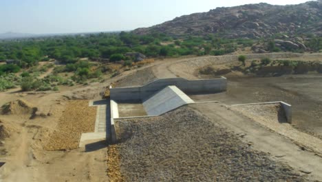 Aerial-View-Of-Concrete-Barrier-Structure-In-Open-Landscape-In-Pakistan