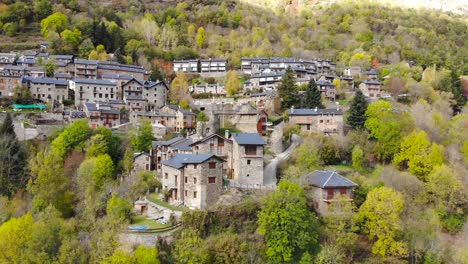 Aerial:-small-town-in-mountainous-terrain-in-the-catalan-countryside