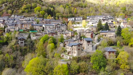 Aerial:-small-town-in-mountainous-terrain-in-the-catalan-countryside