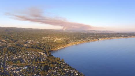 Aerial-view-of-smoke-from-brush-fires-between-Watsonville-and-Morgan-Hill,-California-as-seen-from-the-Bay