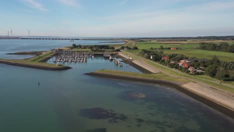 Aerial-shot-of-a-marina-on-the-Dutch-coast-on-a-sunny-day