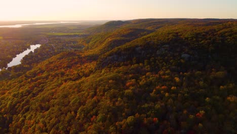 Aerial-view-of-the-sun-setting-on-the-edge-of-the-Ottawa-Valley-in-autumn