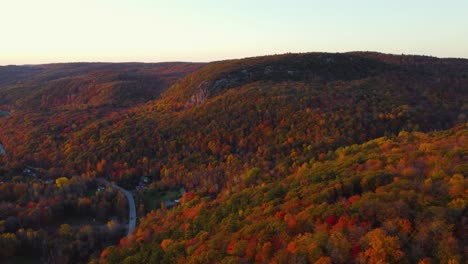 Aerial-rotating-view-of-the-edge-of-Gatineau-Park-and-Hollow-Glen-near-Ottawa