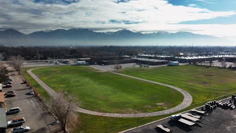 Aerial-View---Redwood-School-Field-in-West-Valley-City,-Utah,-Forward-movement