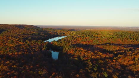 Aerial-view-of-lakes-in-Gatineau-Park-at-sunset-in-autumn