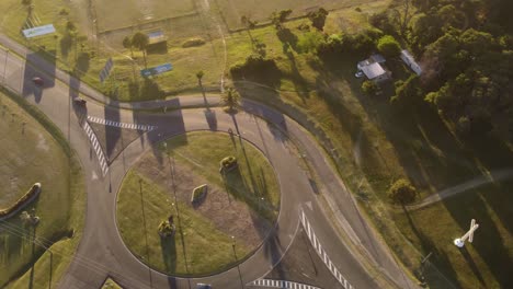 A-drone-birdseye-view-of-a-roundabout-in-a-city-of-Uruguay