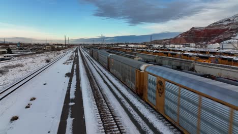 Aerial-Shot-of-Moving-Train-at-North-Salt-Lake-Railways-in-Utah-