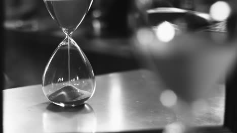 Close-up-hourglass-on-table