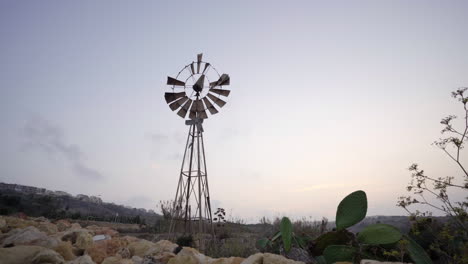 Diminished-rusted-power-source-windmill-on-Gozo-Malta-land