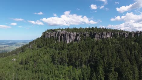 Wide-Aerial-Shot-Of-Dense-Forest-In-The-Rocky-Mountains-4K