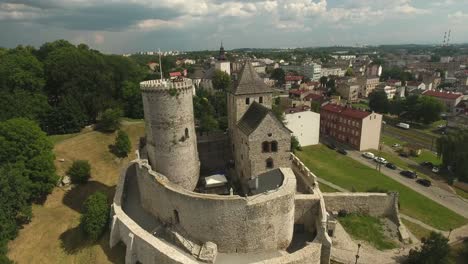 Aerial-Drone-Shot-Of-Old-Medieval-Castel-In-Small-Town-4K