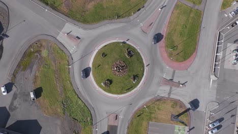 Top-down-above-circular-roundabout-in-small-Hella-town,-Iceland