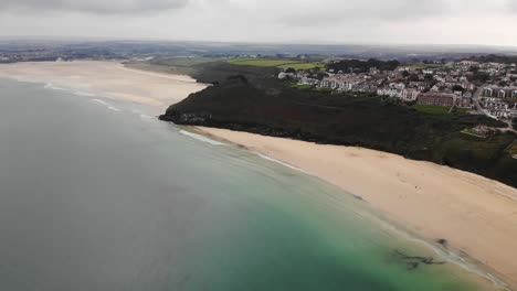 Aerial-panning-left-shot-of-Carbis-Bay-and-Gwithian-Beach-Cornwall-England