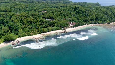 Exotic-travel-destination-tropical-Wediombo-beach-on-coast-of-Java,-Indonesia,-aerial-view