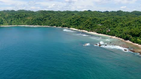 Aerial-view-on-beautiful-exotic-Wediombo-beach-on-coast-of-Java-Island-Indonesia