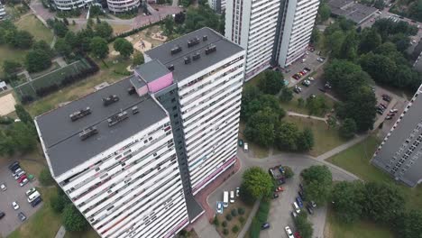 Dynamic-Rotation-Drone-Shot-Of-80's-Communist-Residential-Area-4K