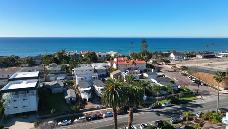 Aerial-shot-over-the-residential-houses-and-roads-by-the-beachside-in-Encinitas,-California,-USA