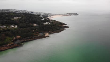 Aerial-panning-right-shot-of-Porthminster-Point-with-St-Ives-in-the-background