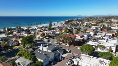 Aerial-drone-shot-taken-from-over-the-city-of-Encinitas-in-Southern-California,-USA-of-the-pristine-blue-sea-on-a-beautiful-sunny-day