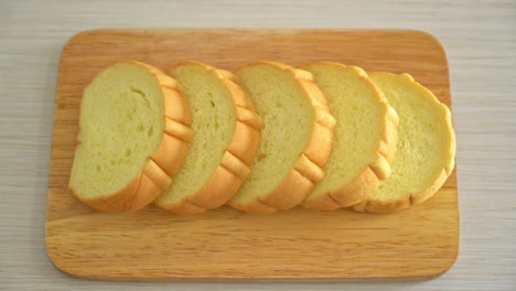 potatoes-bread-sliced-on-wood-board
