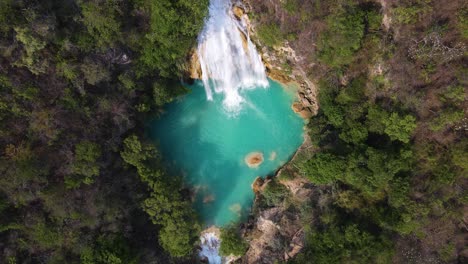 Aerial:-tropical-waterfall-in-Mexico,-beautiful-natural-formation-in-jungle,-4K