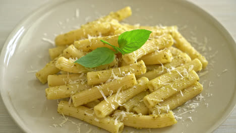 pesto-rigatoni-pasta-with-parmesan-cheese---Italian-food-and-vegetarian-food-style