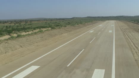 Aerial-View-Along-Empty-Tarmac-Runway-Of-Thar-Airport