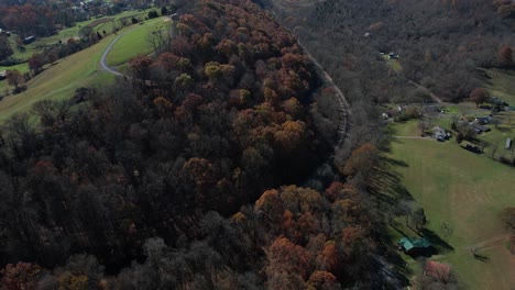 Aerial-View-of-Warriors-Path-State-Park,-Colonial-Heights,-Tennessee-USA,-Railroad-and-Forest-on-Sunny-Autumn-Day,-Drone-Shot