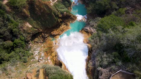 Aerial-view-over-top-of-waterfall,-looking-down-cascade-in-Mexico