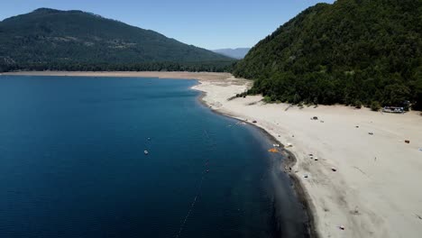 Aerial-view-of-the-Playa-Blanca-at-the-caburgua-lake-in-southern-chile---drone-shot