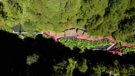 Landing-at-the-termas-geometricas-hot-springs-at-conaripe-in-the-south-of-chile---aerial-view