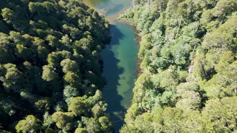 Aerial-view-of-lake-chico-in-huerquehue-national-park,-chile---drone-shot