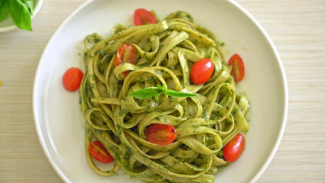 fettuccine-spaghetti-pasta-with-pesto-sauce-and-tomatoes---vegan-and-vegetarian-food-style